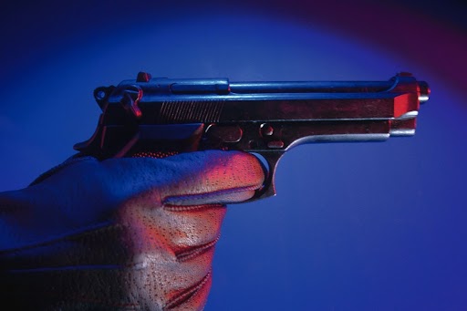 closeup shot of a gun in a hand